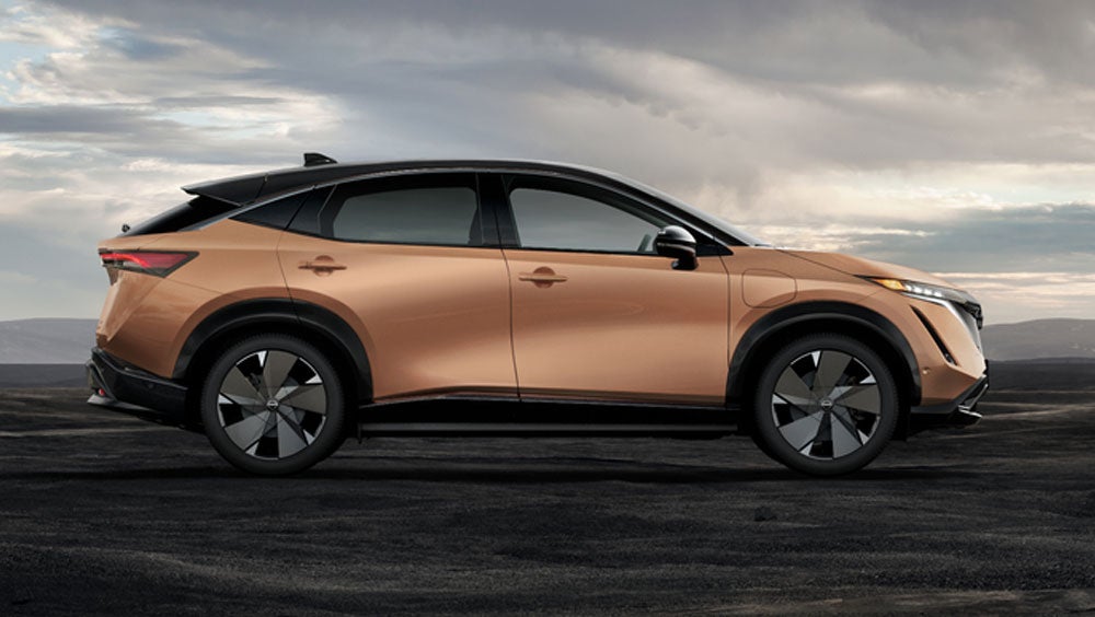 Nissan ARIYA in Sunrise Copper in dramatic landscape | First Nissan of Simi Valley in Simi Valley CA
